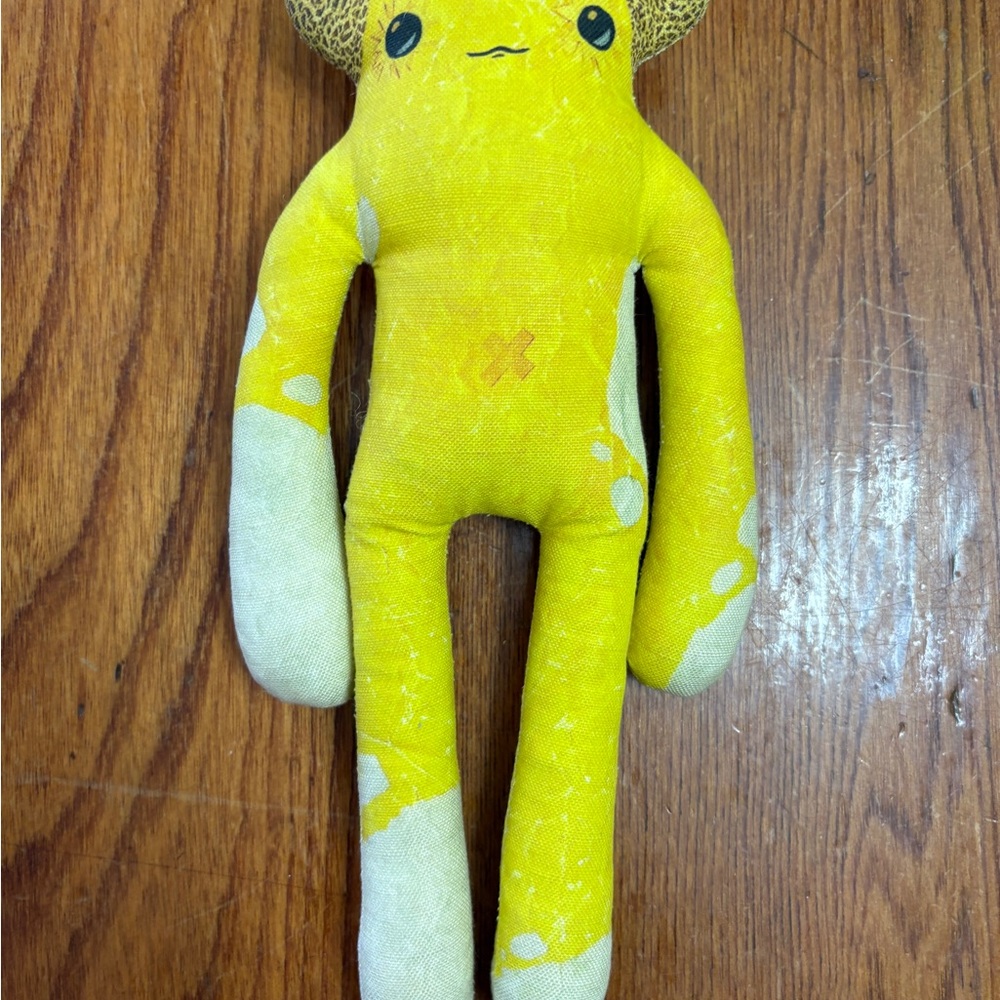 Papercut Monster" plush toy named Benjamin, designed by Joel Kadziolka.
